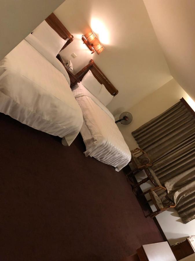 England Business Motel Yilan Exterior photo